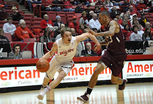 Randy Davis driving the ball in the game against Southern Illinois in arena on Saterday. DN PHOTO ASHLEY XING