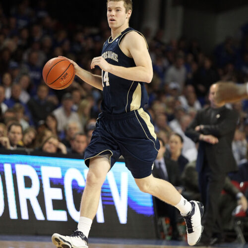 LOUISVILLE, KY - DECEMBER 08: Scott Martin #14 of the Notre Dame Fighting Irish dribbles the ball during the game against the Kentucky Wildcats in the 2010 DIRECTV SEC/BIG EAST Invitational at Freedom Hall on December 8, 2010 in Louisville, Kentucky.  (Photo by Andy Lyons/Getty Images)